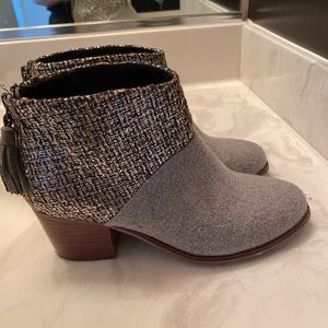 Tom’s grey booties
